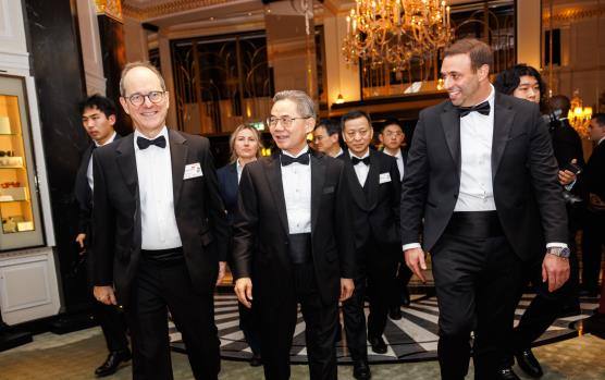 Guests in black tie arriving at the ballroom